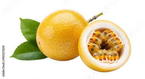 Fresh passionfruit with green leaves and cut open showing seeds