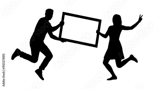 Jumping couple silhouette holding empty picture frame