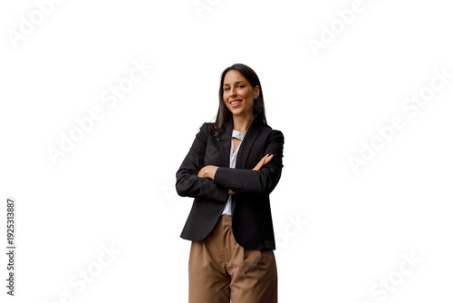 Photography Confident business woman standing with arms crossed, smiling, portraying success