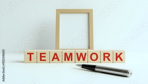 Teamwork concept with wooden blocks and pen on white background symbolizing collaboration and partnership