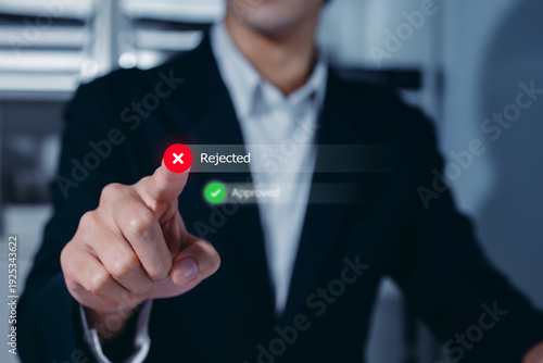 Bild auf Leinwand Businessman pressing virtual Rejected button with check mark on digital interface, decision denial