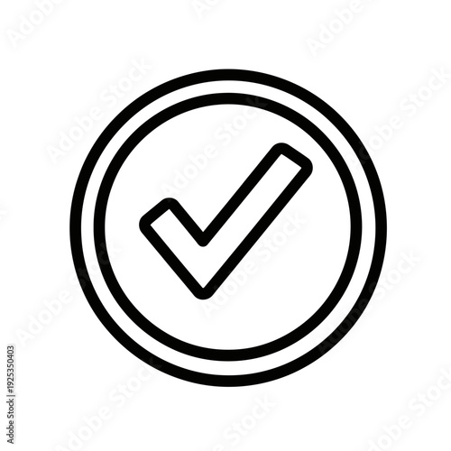 A serene high-angle shot captures a minimalist modern living room featuring a plush grey sofa and wooden accents bathed in soft natural morning light