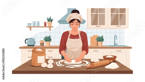 Woman wearing an apron happily kneading dough on a wooden table in a modern kitchen, preparing homemade bread or pizza from scratch.