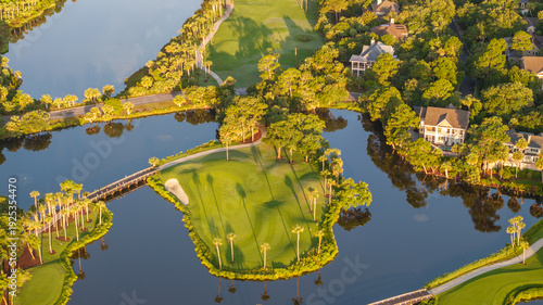 Tableau sur toile Aerial view of beautiful golf course landscape near oceanfront beach on lowcount