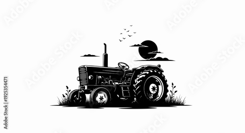 Vintage tractor in a field at sunset with birds flying overhead