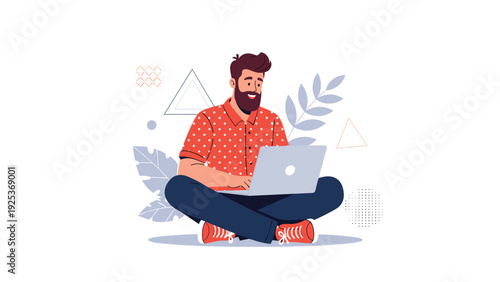 Modern man sitting cross-legged on the floor while working on a laptop computer with creative abstract design elements.