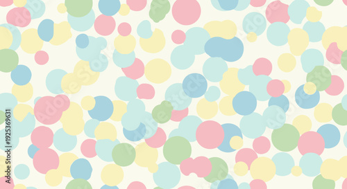 Whisk pattern of colorful dots in pastel shades scattered randomly across a soft background viewed from directly above