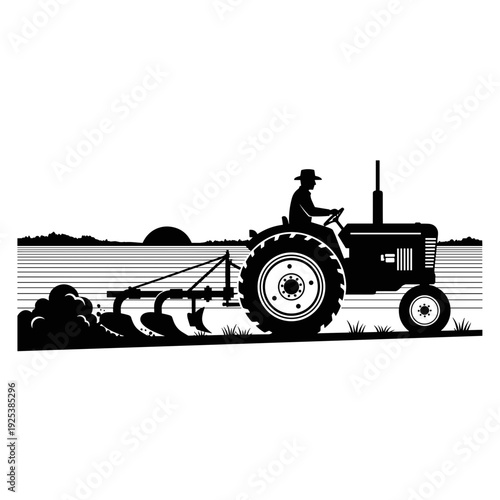 Silhouette of a farmer driving a tractor plowing a field at sunset.