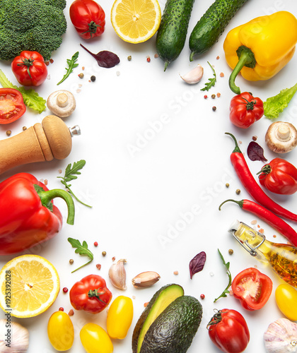 Fresh healthy organic vegetables and herbs forming frame