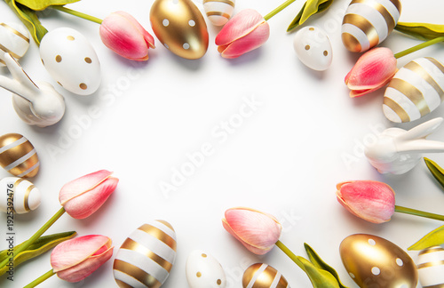 Easter eggs tulips and bunnies creating festive border