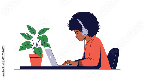 Black woman with headphones and a large afro works diligently on her laptop computer at a desk with a green potted plant in a quiet office.