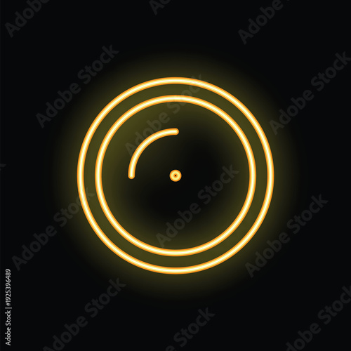 Bright yellow neon sign in the shape of a vinyl record glowing on a black background