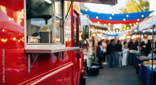 Red food truck service window at outdoor street market festival