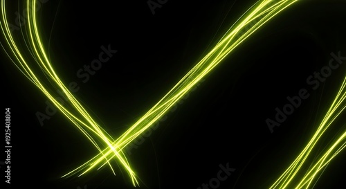 Glowing yellow neon light trails on a dark background