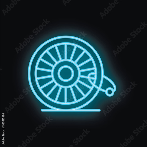Blue neon sign of a casino roulette wheel is glowing on black background