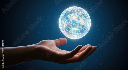 Human hand cradles glowing, multifaceted orb against dark starry backdrop
