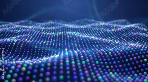 Abstract digital data visualization with glowing colorful particles forming a dynamic wave pattern on a dark background.
