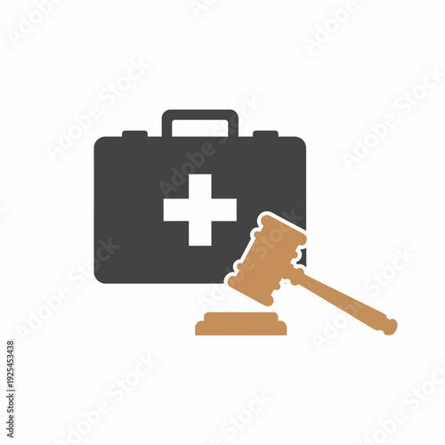 Medical legal concept with a first aid kit and a gavel representing healthcare law.