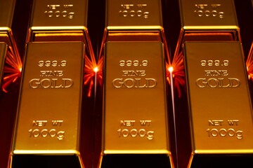 Gold background. Metal gold texture. Gold in bullion backdrop. Gold for trading wallpaper.