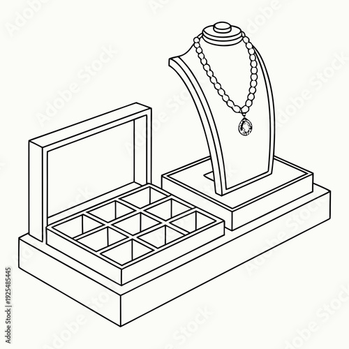 A necklace on a display stand next to an open jewelry box