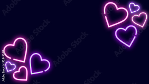 暗い紺の背景にピンクと紫のネオンハートが対角に輝くシンプルでポップな16:9フレーム背景