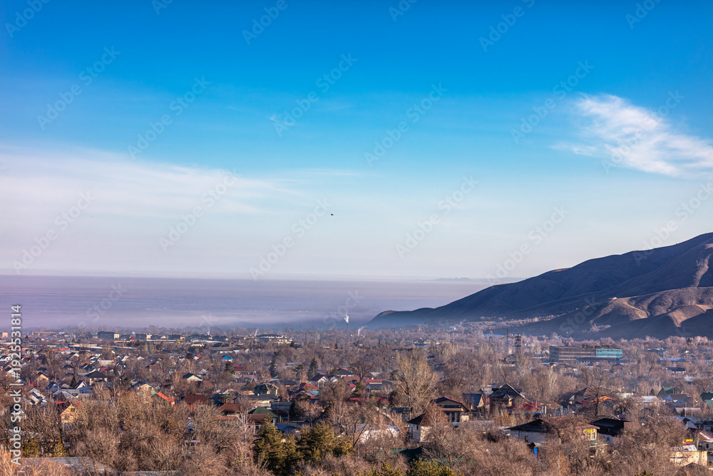 Obraz premium Landscape, mountain, trees, snow, city, winter, river, stream.