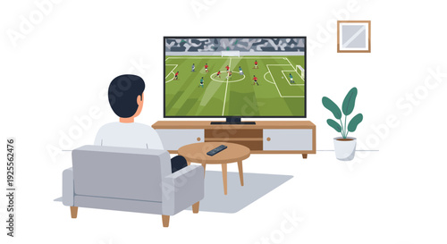 A man sits in a gray armchair watching a soccer match on a large television screen in a living room with a wooden coffee table and plant.