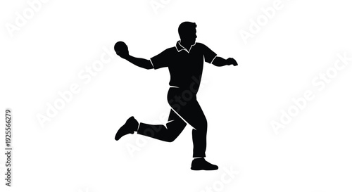 Silhouette of a cricket bowler in mid action during a delivery