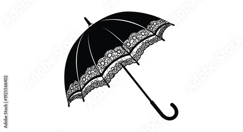 Elegant black umbrella with ornate lace detailing isolated on white