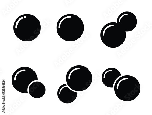 Black Bubbles and Spheres on White Background