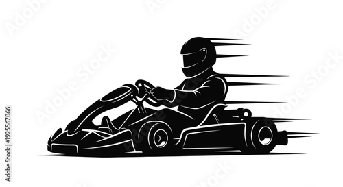 A silhouette of a driver racing a go kart at high speed