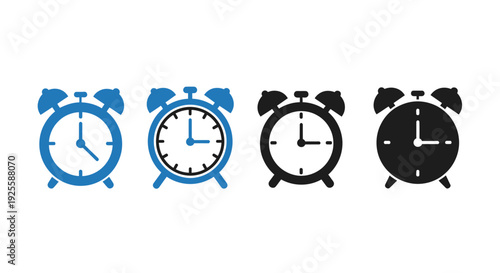Four alarm clocks in varying styles including a dark silhouette