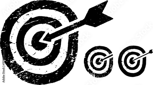 Grunge dartboard targets with arrows hitting the bullseye in black and white design