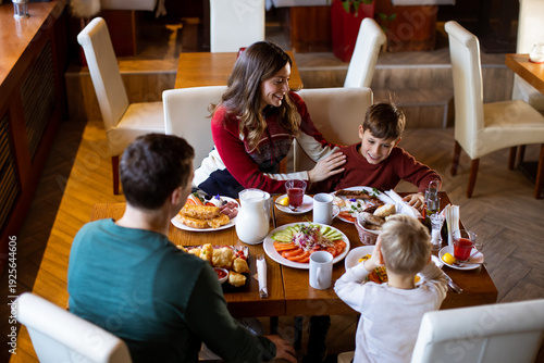 Kids enjoy breakfast togeth...