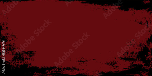 Red grunge paint stroke on black background with distressed brush texture