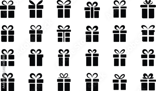 Black and white gift boxes with ribbons arranged in a grid pattern