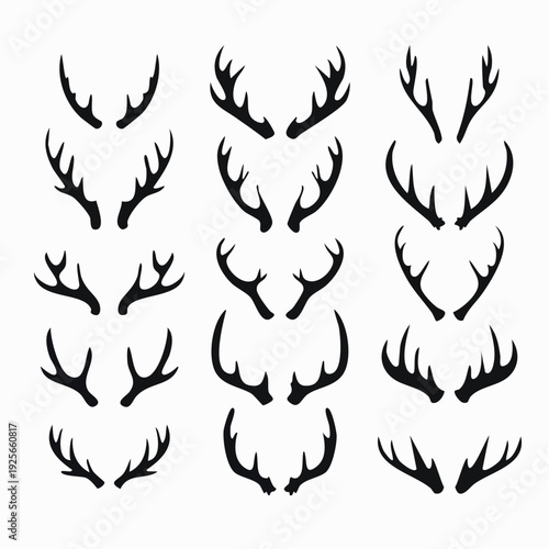 Collection of diverse black deer antlers vector silhouettes on white background for design