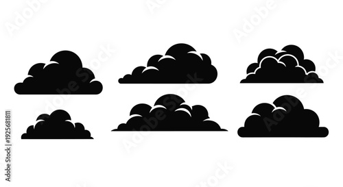 A collection of dark fluffy clouds depicted in stark silhouette