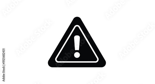 Black triangular warning sign with an exclamation point a stark silhouette