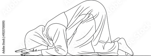 Serene woman in hijab kneeling in prayer with closed eyes