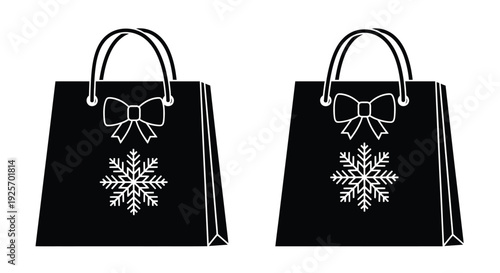 Two black shopping bags with white snowflake and bow designs