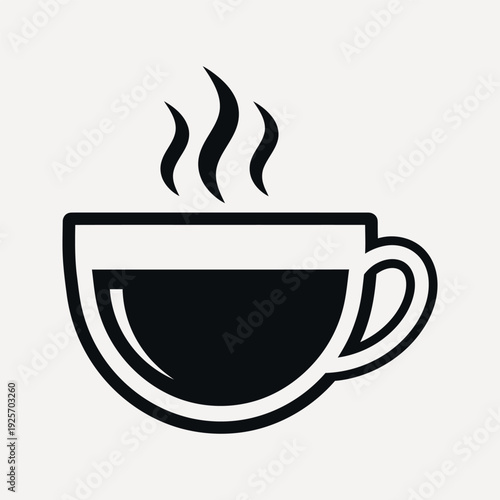 Black steaming coffee cup with dark liquid and wisps of steam on a light background hot drink