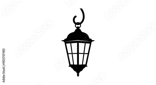 Black silhouette of a vintage hanging lantern with ornate detailing