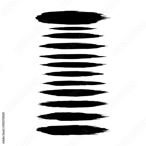 This image shows black brush stroke marks in various sizes isolated on a transparent background