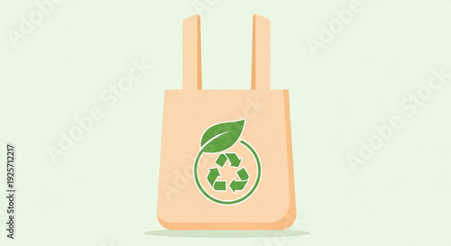 Eco friendly reusable bag with recycling symbol and green leaf on light background for sustainable living