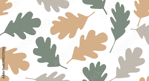 Simple and modern seamless pattern of oak leaf silhouettes in muted, earthy colors like sage green and beige creates an elegant and natural botanical background.