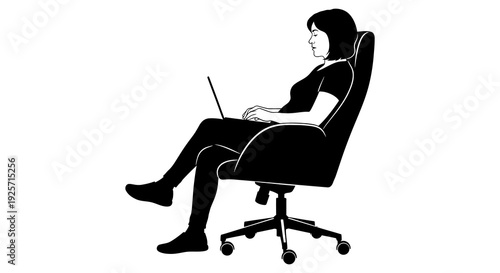 Silhouette of a woman seated in an office chair using a laptop