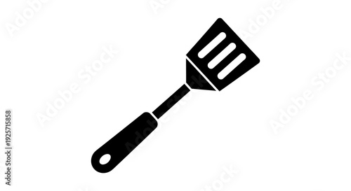 Simple black silhouette of a kitchen spatula a common cooking utensil