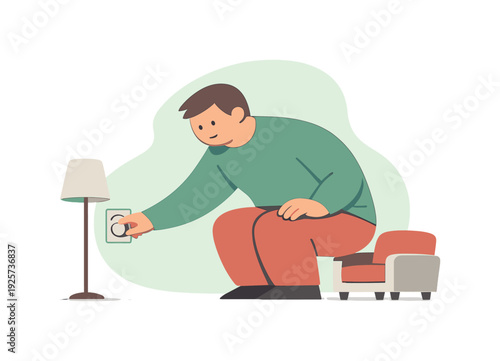 Man turning on a lamp by plugging it into a wall socket while sitting on a couch