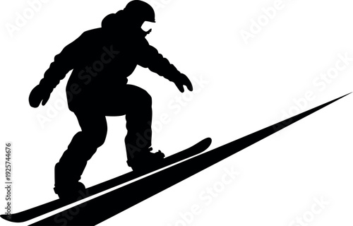 Silhouette of a person snowboarding down a slope